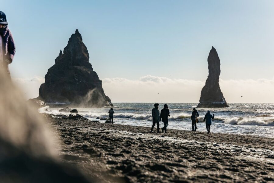 From Reykjavik: South Coast & Glacier Hike - Reynisfjara black sand: basalt columns, Reynisdrangar, and sneaker waves