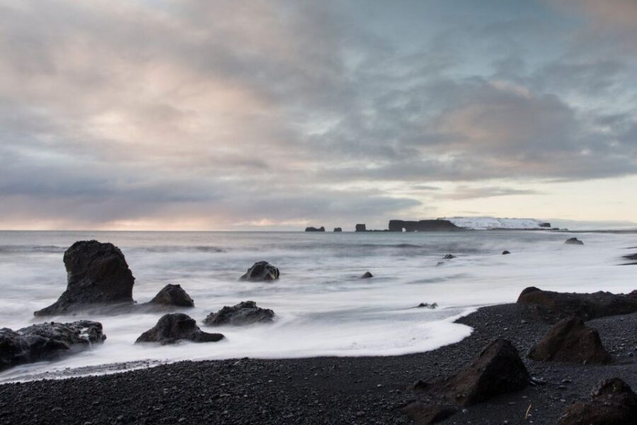 From Reykjavik: South Coast Tour & DC-3 Plane Wreck - Dyrhólaey cliffs: sea arch views and puffins season timing