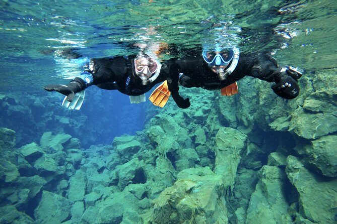 Golden Circle & Snorkeling in Silfra From Reykjavík with Free Photos - Silfra Fissure snorkeling: dry-suit fitting, what you’ll see, and what to expect underwater