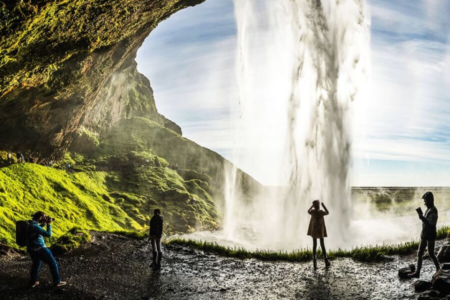 Iceland: Full-Day South Coast, Black Beach & Waterfalls Tour - Reynisfjara black sand beach: basalt columns and big ocean energy