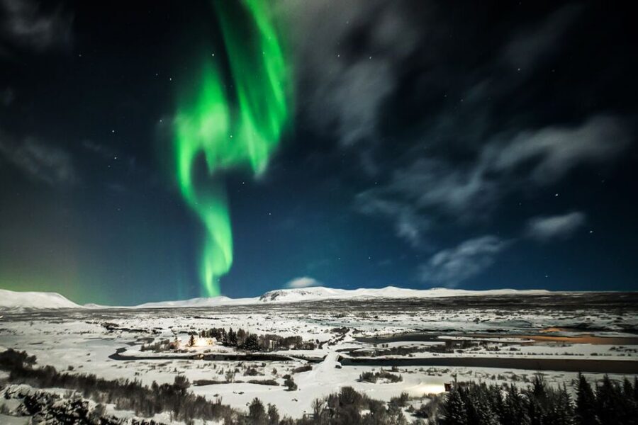 Iceland: Northern Lights Bus Tour from Reykjavik - From Reykjavik Brightness to Dark Skies: How Stops Help