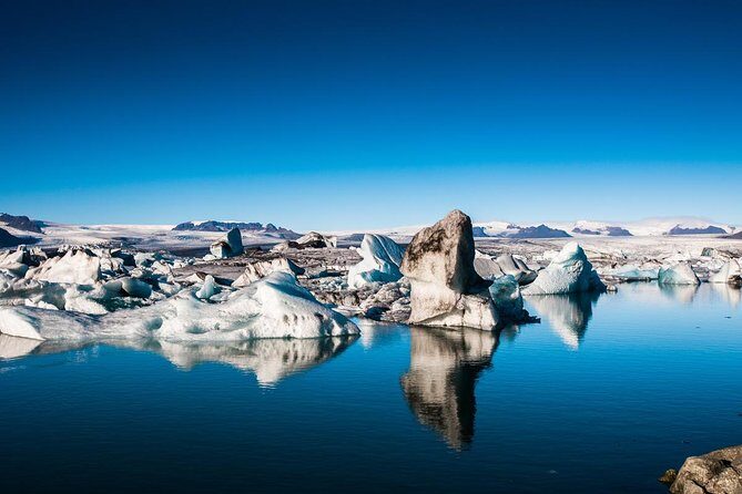 Reykjavik: Glacier Lagoon, Diamond Beach & South Coast Day Tour - Jökulsárlón Lagoon: where the icebergs do the talking