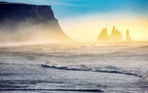 Reykjavík: South Coast Waterfalls, Black Sand & Glacier Tour - Seljalandsfoss from the back side: when the spray is your souvenir