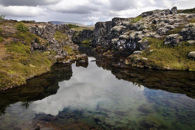 Silfra Drysuit Snorkeling Tour with Free Photos - From Reykjavik - Key things to know before you book Silfra Drysuit Snorkeling