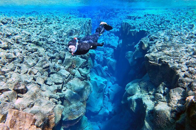 Silfra Wetsuit Snorkeling - Meet on Location | Free Photos - Wetsuit vs Drysuit: Choosing Warmth and Movement