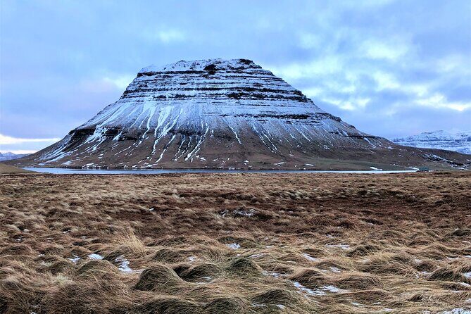Snaefellsnes, Mt. Kirkjufell & Black Sand Beach Small-Group Tour - Arnarstapi coast and Snjófell Restaurant: sagas, cliffs, and real village time