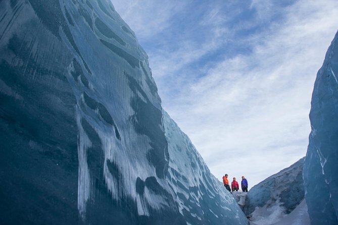 Sólheimajökull Glacier Hike & Ice Climbing Intro - Small Group - The Yellow School Bus and Gear Up Moment