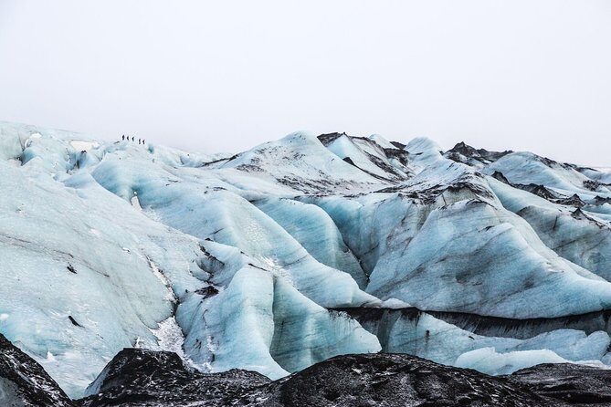 Sólheimajökull Glacier Hike - Small Group Blue Ice Adventure - Step Onto the Glacier: Crampons, Ice Formations, and Real Scale