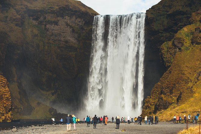 South Coast Day Tour Black Sand Beach & Waterfalls from Reykjavik - Solheimajokull Glacier: The Walk to the Edge and Touching the Ice