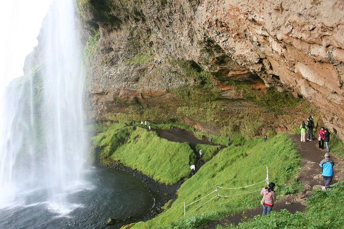South Coast, Waterfalls and Black Beach Tour from Reykjavik - Transport, Timing, and Group Size on a 10-Hour Coach Ride